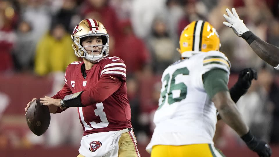 49ers quarterback Brock Purdy looks to pass during the second half against the Green Bay Packers in the NFC divisional playoff game. - Thearon W. Henderson/Getty Images