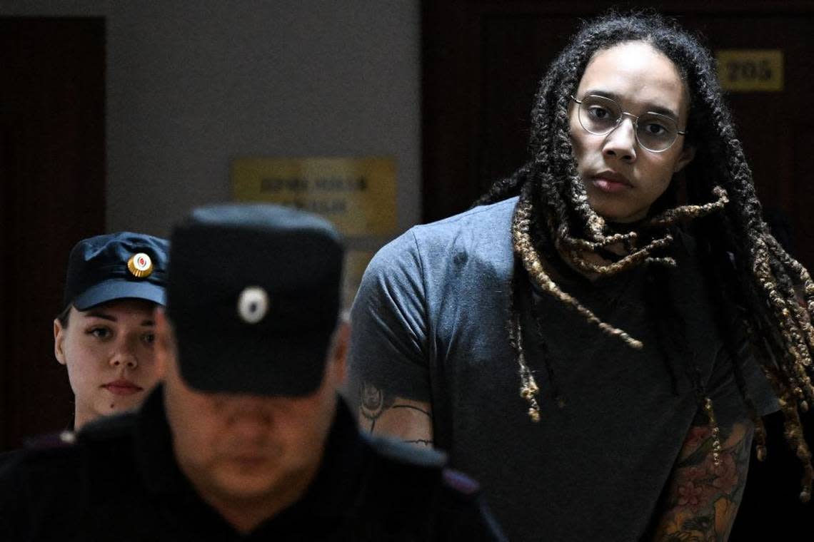 US Women National Basketball Association’s (WNBA) basketball player Brittney Griner, who was detained at Moscow’s Sheremetyevo airport and later charged with illegal possession of cannabis, is escorted to the courtroom to hear the court’s final decision in Khimki outside Moscow, on August 4, 2022. - Russian prosecutors requested that US basketball star Brittney Griner be sentenced to nine and a half years in prison on drug smuggling charges. Her hearing comes with tensions soaring between Moscow and Washington over Russia’s military intervention in Ukraine that has sparked international condemnation and a litany of Western sanctions. (Photo by Kirill KUDRYAVTSEV / AFP) (Photo by KIRILL KUDRYAVTSEV/AFP via Getty Images)