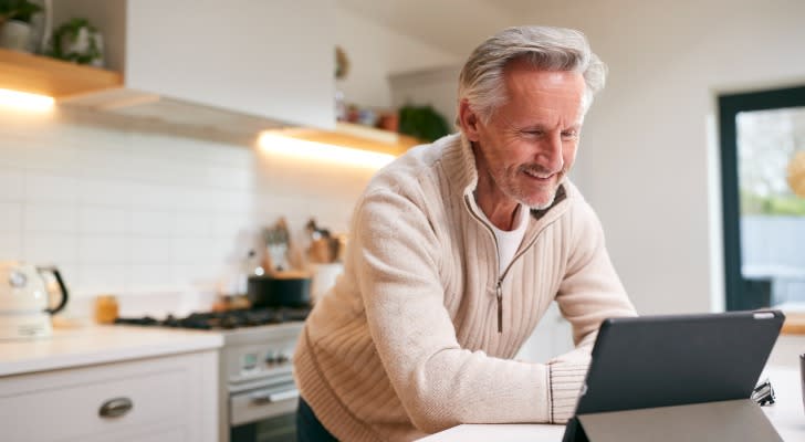 A man excited to retire at 62 with $400,000