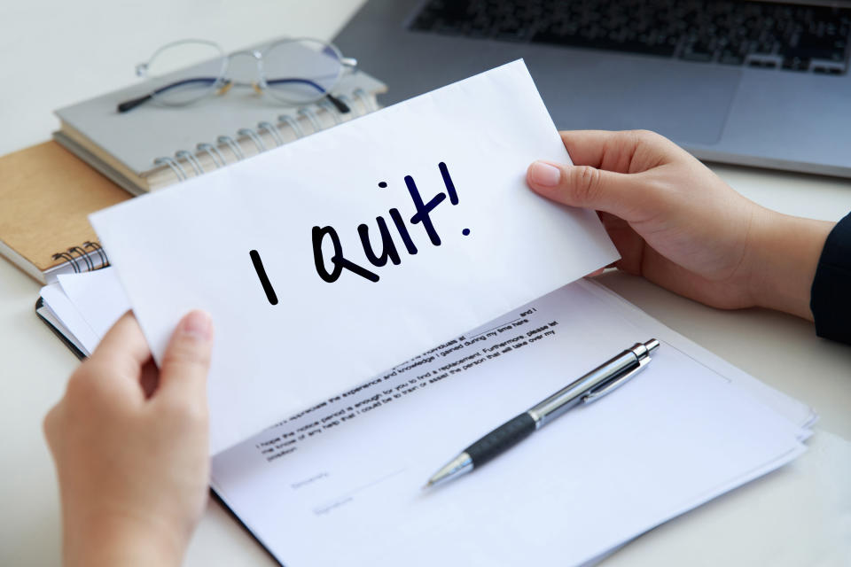 Woman writing her resignation