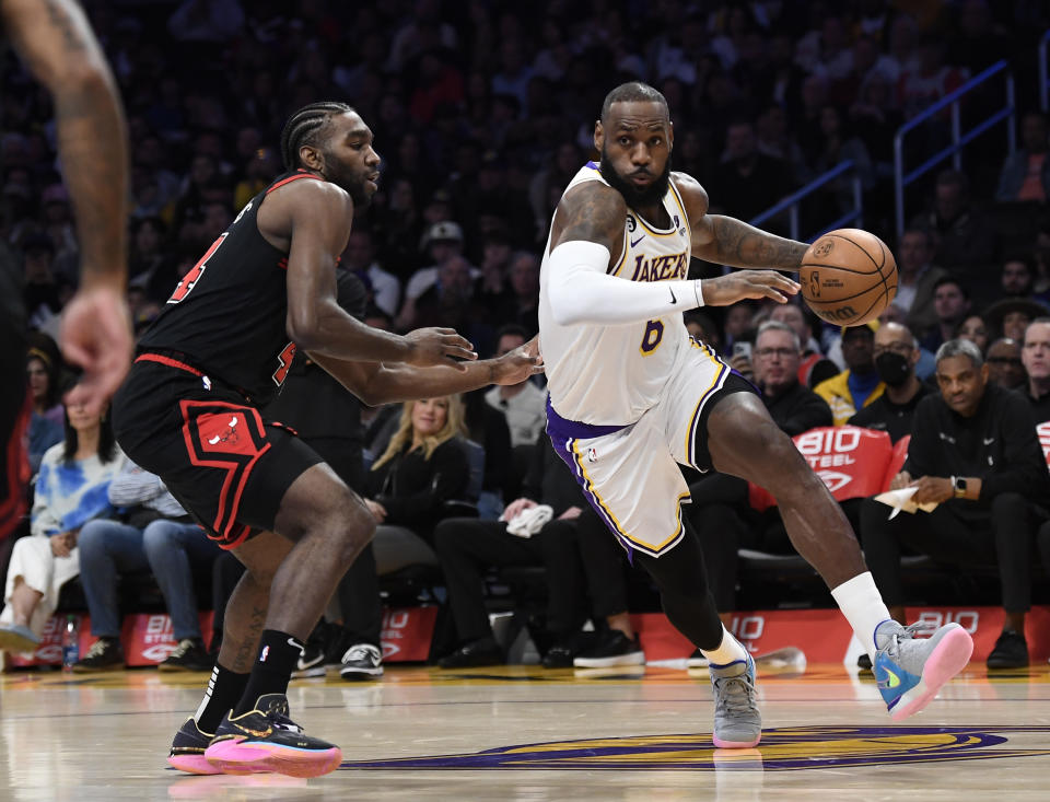 LOS ANGELES, CA - MARCH 26: LeBron James #6 of the Los Angeles Lakers drives around Patrick Williams #44 of the Chicago Bulls during the first half at Crypto.com Arena on March 26, 2023 in Los Angeles, California. NOTE TO USER: User expressly acknowledges and agrees that, by downloading and or using this photograph, User is consenting to the terms and conditions of the Getty Images License Agreement.(Photo by Kevork Djansezian/Getty Images)