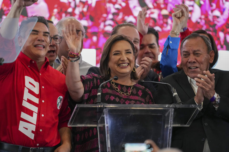 Opposition presidential candidate Xochitl Galvez waves after polls closed during general elections in Mexico City, Sunday, June 2, 2024. (AP Photo/Marco Ugarte)