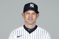 FILE - This is a Feb. 24, 2021, photo showing Aaron Boone of the New York Yankees baseball team. The New York Yankees announced Wednesday, March 3, 2021, that manager Aaron Boone is taking an immediate medical leave of absence to receive a pacemaker. (Mike Carlson/MLB Photos via AP, Pool)