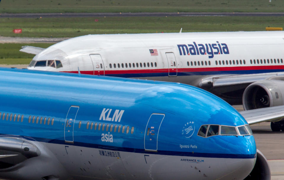Two Boeing-777 aircrafts of KLM and Malaysia Airlines seen at Schiphol airport, Amsterdam, Netherlands. (Photo by: aviation-images.com/Universal Images Group via Getty Images)