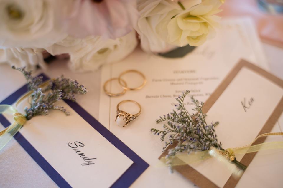 Place cards at the pearl-themed Steinkamp wedding in April 2024.