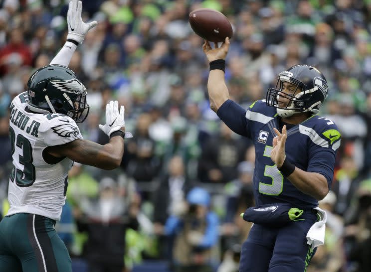 Russell Wilson throwing against Philadelphia, before he caught a touchdown pass (AP)