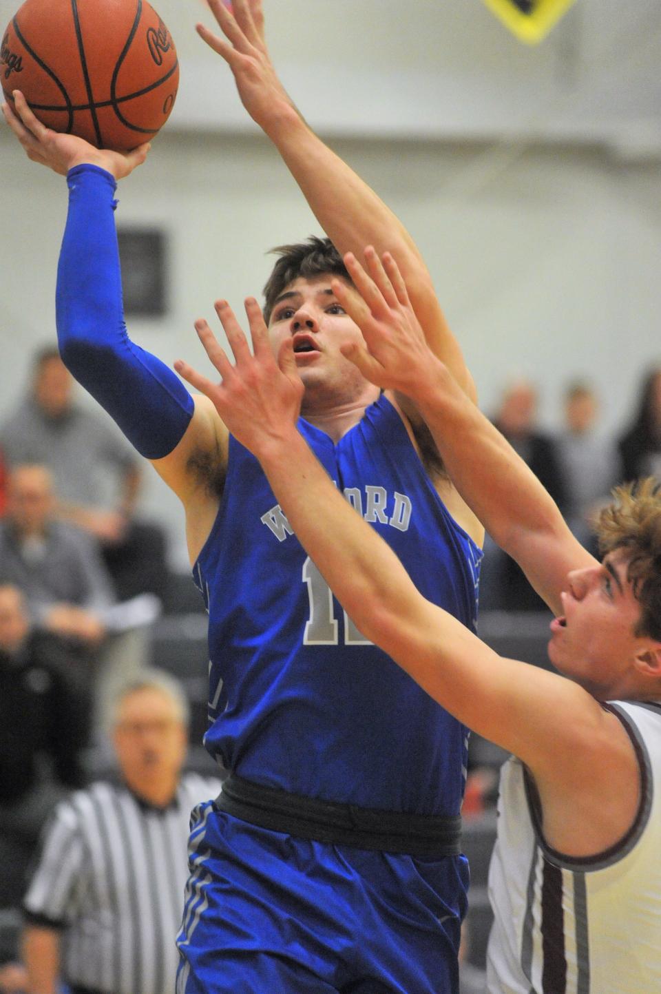 Wynford's Grant McGuire finishes at the rim.