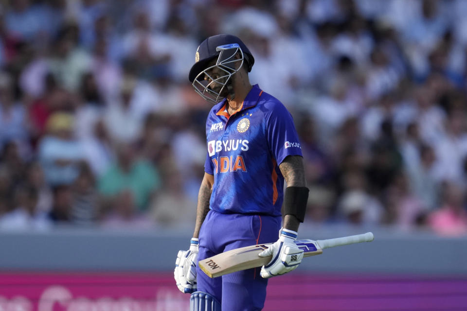 India's Suryakumar Yadav walks off the field of play after losing his wicket from the bowling of England's Reece Topley during the second one day international cricket match between England and India at Lord's cricket ground in London, Thursday, July 14, 2022. (AP Photo/Matt Dunham)
