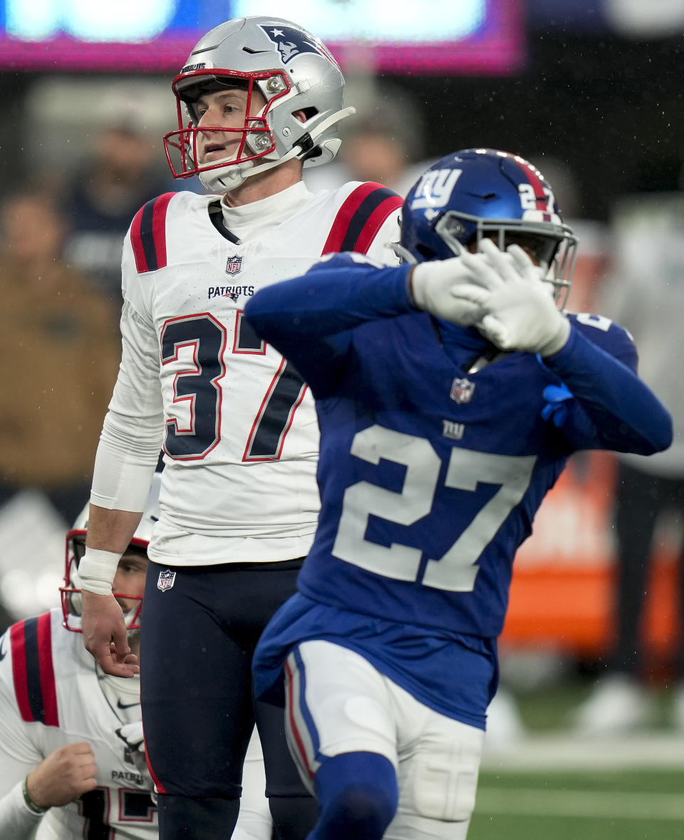 New England Patriots place kicker Chad Ryland (37) watches his field goal attempt sail wide left with seconds left on the clock during the fourth quarter against the New York Giantsof an NFL football game, Sunday, Nov. 26, 2023, in East Rutherford, N.J. (AP Photo/Seth Wenig)