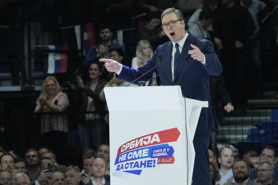 Serbian President Aleksandar Vucic speaks during a pre-election rally of his ruling Serbian Progressive Party in Belgrade, Serbia, Saturday, Dec. 2, 2023. Serbia's President Vucic is pushing hard to reassert his populist party's dominance at this weekend's early parliamentary and local elections that observers say are being held in an atmosphere of intimidation and media bias. (AP Photo/Darko Vojinovic)