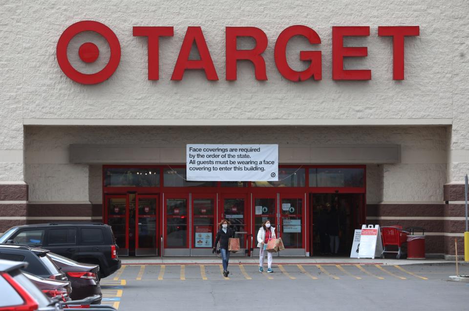 File photo: Target in Henrietta had a large sign hanging over their entrance reminding people that they must wear masks before entering the store on Nov. 17, 2020.