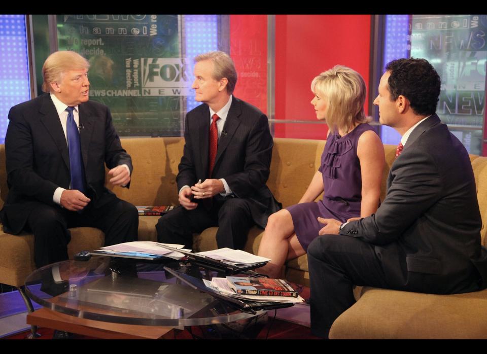 NEW YORK, NY - DECEMBER 06:  (L-R)  Donald Trump talks with 'FOX & Friends' hosts Steve Doocy, Gretchen Carlson and Brian Kilmeade at FOX Studios on December 6, 2011 in New York City.  (Photo by Astrid Stawiarz/Getty Images)