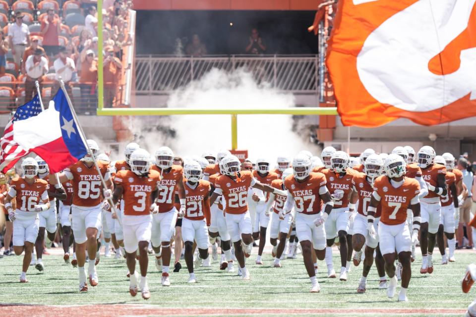 Texas Longhorns take the field before they take on Colorado State at Darrell K Royal-Texas Memorial Stadium in Austin Saturday, Aug. 31, 2024.