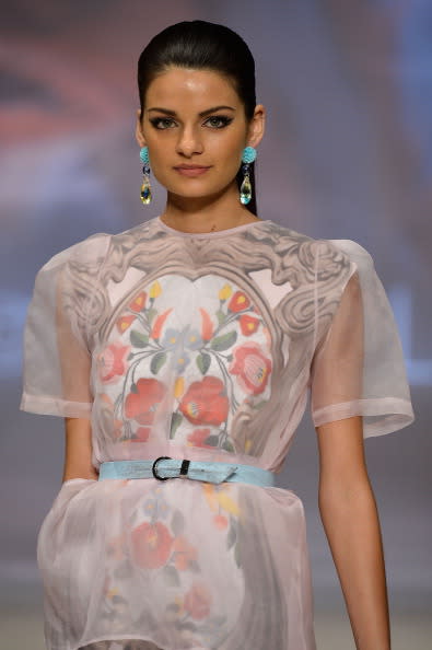 A model showcases designs by Alice McCall on the catwalk as part of Mercedes Benz Fashion Festival Sydney 2012 at Sydney Town Hall on August 23, 2012 in Sydney, Australia. (Photo by Stefan Gosatti/Getty Images)