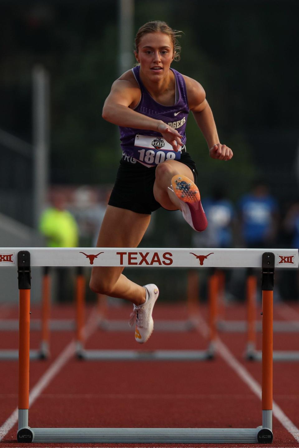 Merkel's Avery Holloway competes in the Class 3A 300-meter hurdles.