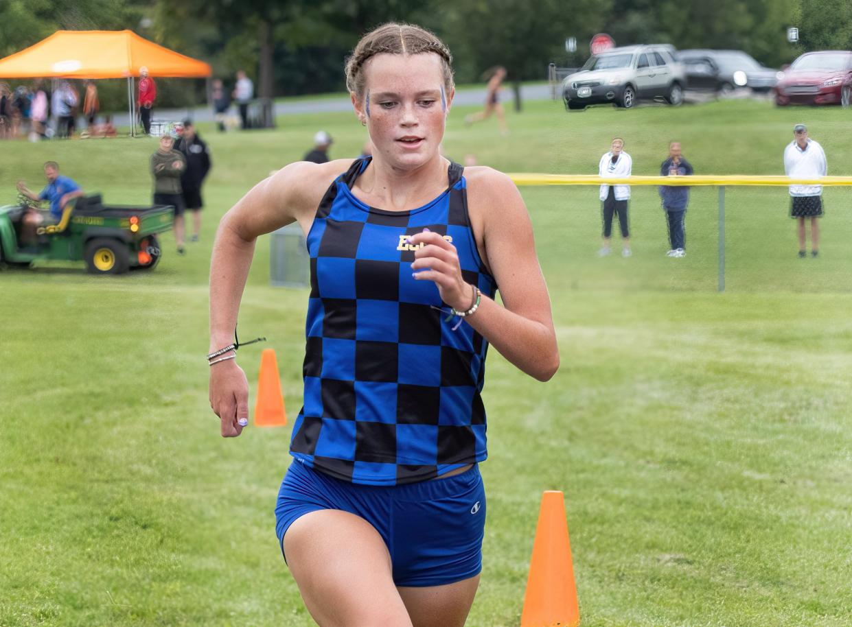 East Canton’s Audrey Wade wins the girls small school division race at this year's East Canton Cross Country Invitational.