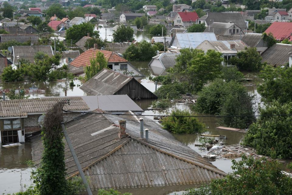 Flooded residential areas of Kherson, seen on June 7, 2023. (Francis Farrell/The Kyiv Independent)