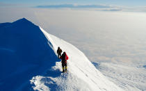 <p>In summer, clouds cloak North America’s highest peak about 85 percent of the time. When skies are blue, the mountain is a wonder to behold, a colossus of rock and ice that rises more than three miles above alpine meadows. To increase your odds of glimpsing it, book your travel in early September, when visibility is typically at its best, and plan to stay for at least a few days. <em>Book lodging and guided park tours through Alaska Wildland Adventures at <a rel="nofollow noopener" href="http://www.alaskawildland.com" target="_blank" data-ylk="slk:alaskawildland.com;elm:context_link;itc:0;sec:content-canvas" class="link ">alaskawildland.com</a>. </em>—Sarah L. Stewart</p>