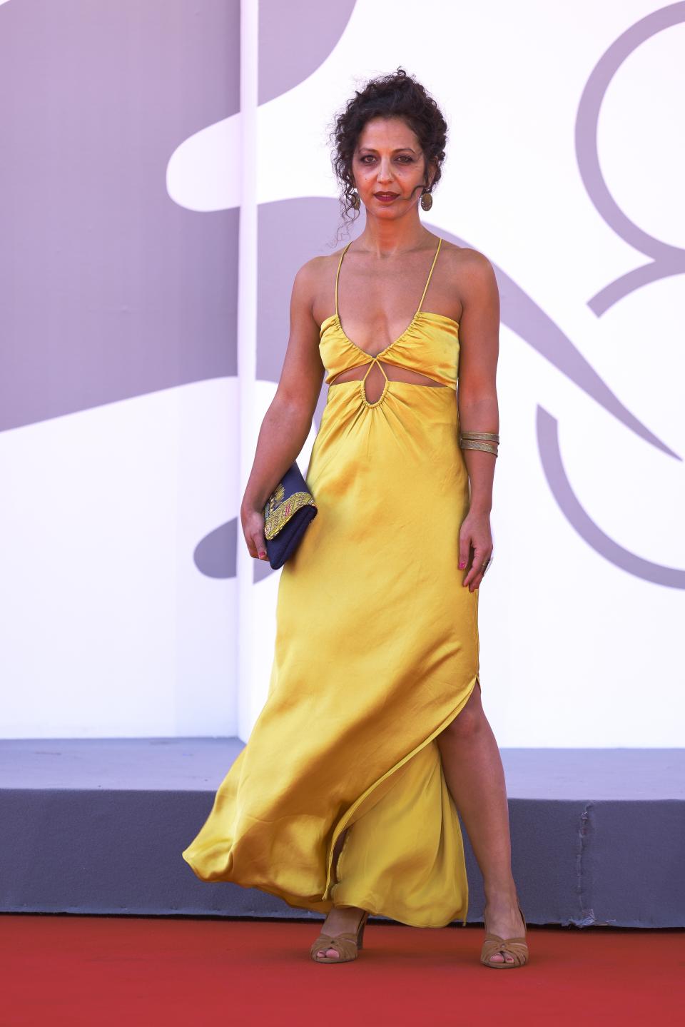 Dalia Naous poses for photographers upon arrival for the premiere of the film 'Green Border' during the 80th edition of the Venice Film Festival in Venice, Italy, on Tuesday, Sept. 5, 2023. (Photo by Vianney Le Caer/Invision/AP)