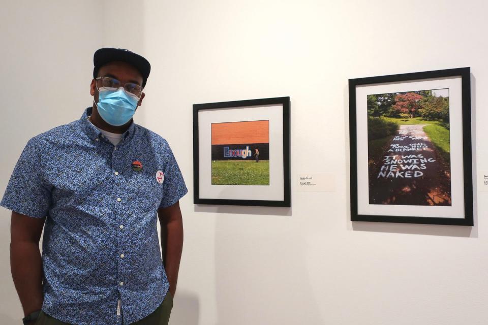 Quajay Donnell standing in front of his two entries in the 67th Rochester-Finger Lakes exhibition. Aug. 15.