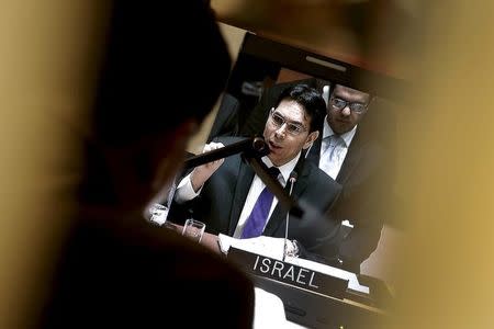 Israel's Ambassador to the United Nations Danny Danon is seen on a screen in an interpreters booth as he addresses a United Nations Security Council meeting on the Middle East at U.N. headquarters in New York, January 26, 2016. REUTERS/Mike Segar