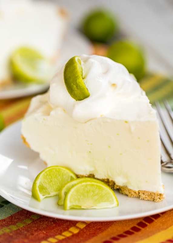 <p>Plain Chicken</p><p>Take the tropical key lime pie to a whole new cool level.</p><p><strong>Get the recipe: <a href="https://www.plainchicken.com/frozen-key-lime-pie/" rel="nofollow noopener" target="_blank" data-ylk="slk:Frozen Key Lime Pie;elm:context_link;itc:0;sec:content-canvas" class="link ">Frozen Key Lime Pie</a></strong></p>