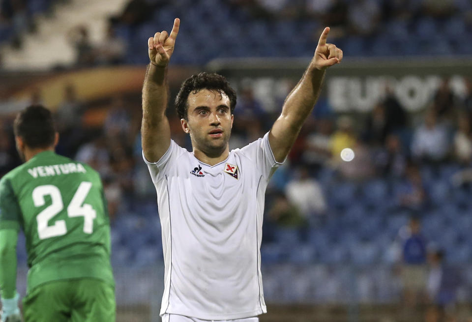 FILE - In this Oct. 1, 2015, file photo, Fiorentina's Giuseppe Rossi celebrates after scoring his side's fourth goal during a Europa League group I soccer match against Belenenses at the Restelo stadium in Lisbon. Rossi has signed with Major League Soccer's Real Salt Lake, 21 months after his last competitive match. The 33-year-old from Clifton, N.J., had spent his entire professional career in Europe after moving when he was 12 to join Parma's youth academy, but he has been derailed by five major knee injuries. (AP Photo/Armando Franca, File)