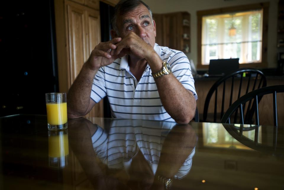 Ariel Quiros sits in his condo at Jay Peak in 2013.