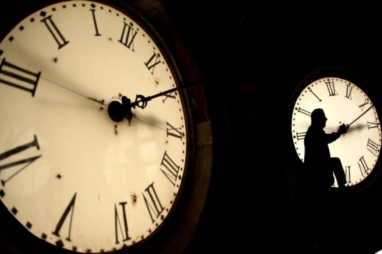 A collage of clocks displaying Roman numerals