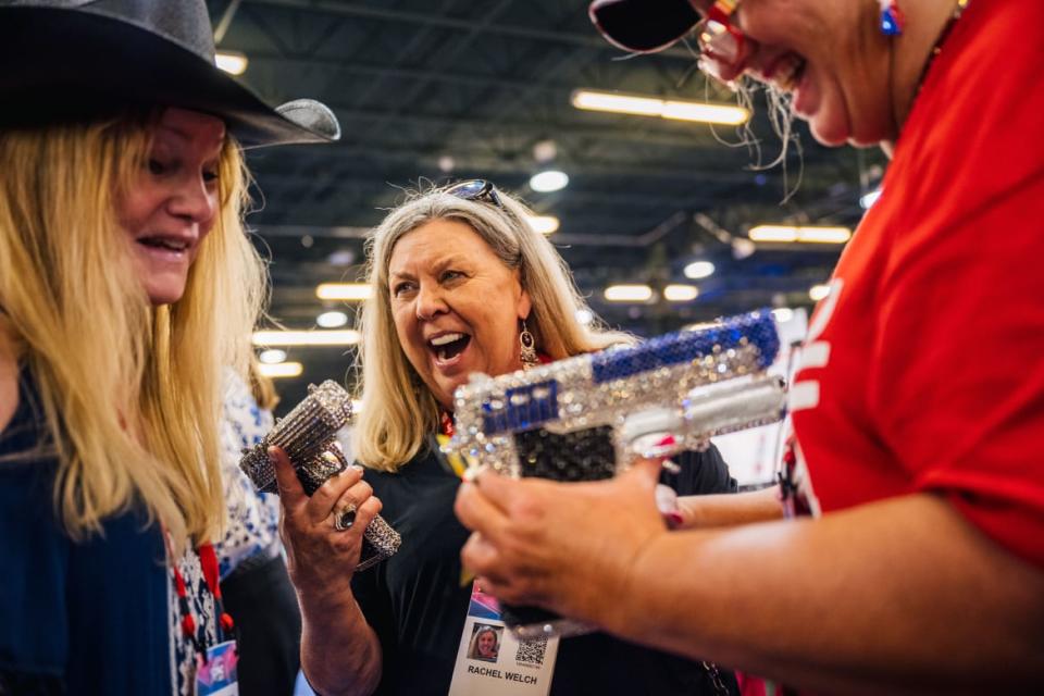 <div class="inline-image__title">1328054138</div> <div class="inline-image__caption"><p>Women express excitement over handgun merchandise during the Conservative Political Action Conference in Dallas. </p></div> <div class="inline-image__credit">Brandon Bell/Getty Images</div>