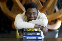 Illinois Institute of Technology student Wofai Ewa, originally from Nigeria, poses for a portrait Friday, Sept. 18, 2020, at the institute's library in Chicago. America was always considered the premiere destination for international students, with the promise of top-notch universities and work opportunities. Yet, 2016 marked the start of an alarming decline of new enrollees, something expected to continue with fresh rules limiting student visas, competition from other countries and a haphazard coronavirus response. (AP Photo/Charles Rex Arbogast)