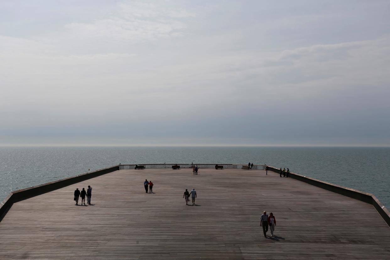 Hastings Pier reopened last year after a major regeneration - Reuters