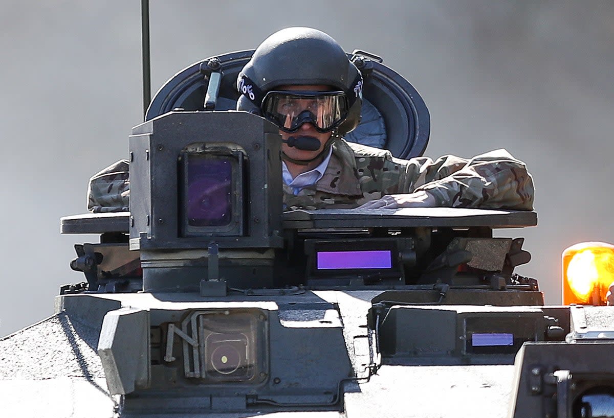 Gavin Williamson takes a ride in a Challenger 2 tank in 2019 (PA)