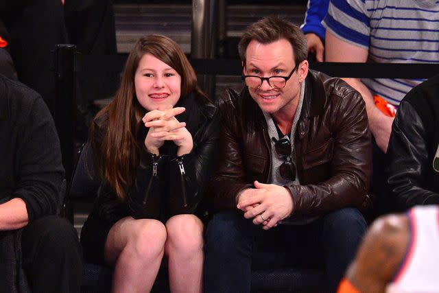 <p>James Devaney/GC Images</p> Christian Slater and his daughter, Eliana, attend the Toronto Raptors vs New York Knicks game at Madison Square Garden in April 2014 in New York City.