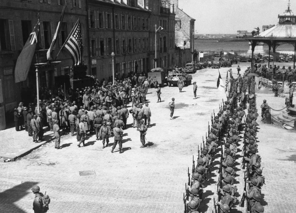FILE - A view of the town hall of Cherbourg, France, on June 28, 1944, during the ceremony held immediately after the Americans had entered the town. At this ceremony the Normandy port was turned back to the French by the Americans. (AP Photo, File)