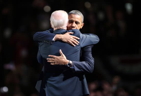 President Barack Obama and Vice President Joe Biden embrace on stage after his victory speech on election night in 2012.