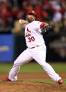 ST LOUIS, MO - OCTOBER 20: Jason Motte #30 of the St. Louis Cardinals pitches in the ninth inning during Game Two of the MLB World Series against the Texas Rangers at Busch Stadium on October 20, 2011 in St Louis, Missouri. (Photo by Jamie Squire/Getty Images)