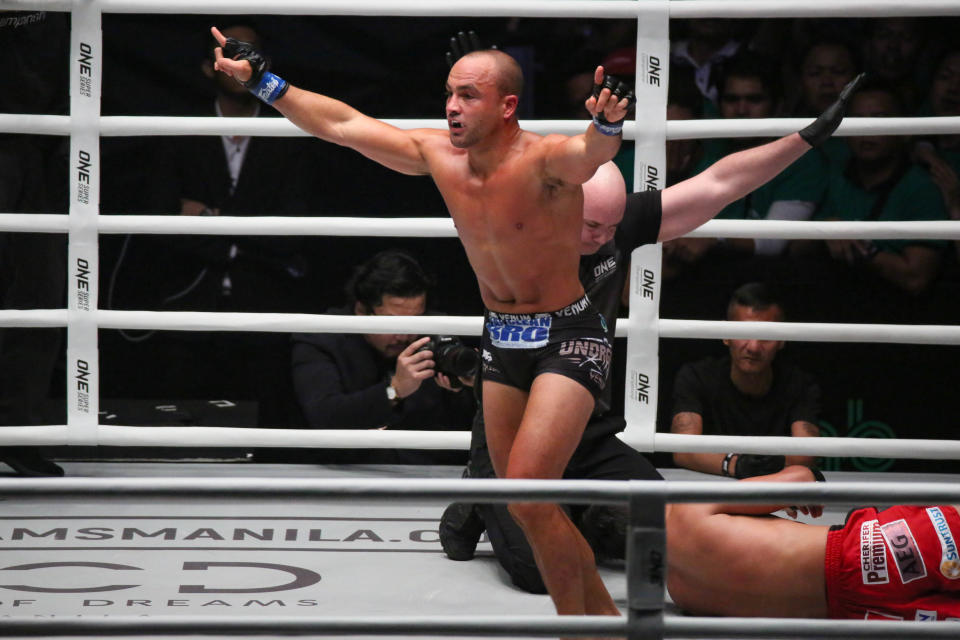 Eddie Alvarez of the USA submits Eduard Folayang of the Philippines during their match for the ONE Championship Dawn of Heroes event held at the Mall of Asia Arena in Pasay City, south of Manila on August 02, 2019. (Photo by George Calvelo/NurPhoto via Getty Images)