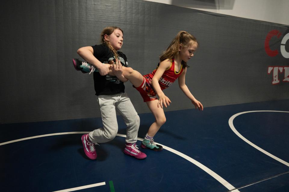 Feb 14, 2024; Fairfield, NJ, United States; (Left) Quinn Cannici, a 7-year-old wrestler from Oakland, is on track to win a coveted Trinity Award if she finishes first at the Reno Worlds in April. Cannici practices with Delaney Coleman, 7, at Cordoba Trained Wrestling Club.