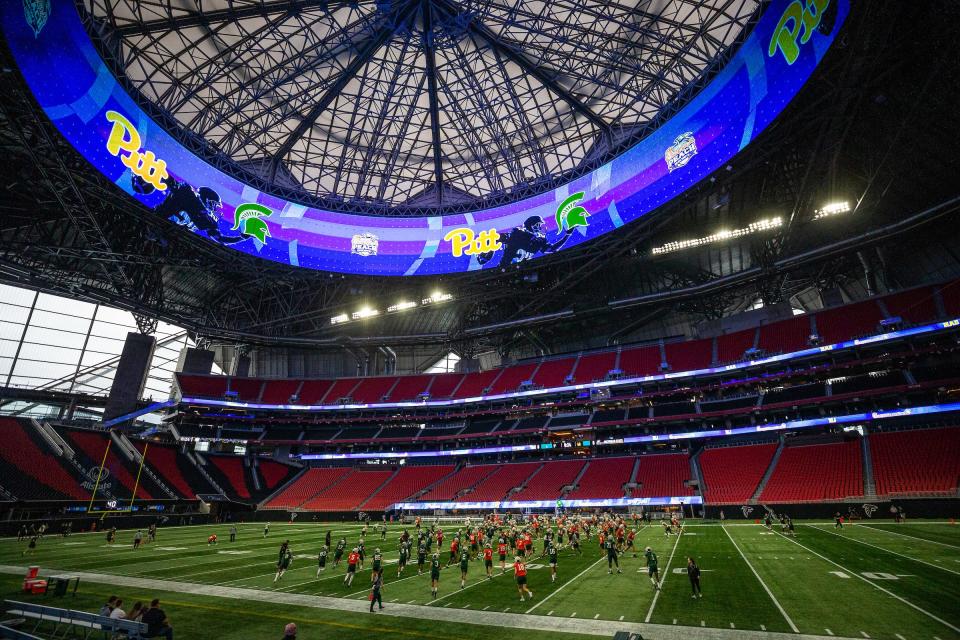 Michigan State practices at the Mercedes-Benz Stadium on Monday prior to Thursday's Peach Bowl in Atlanta.