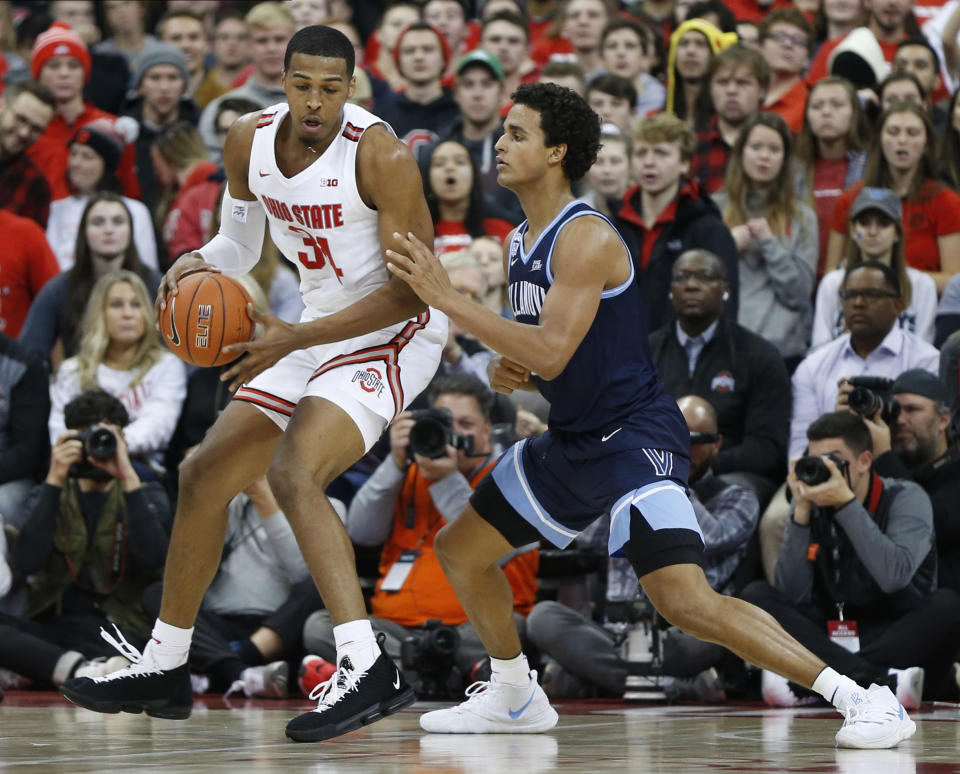 Ohio State's Kaleb Wesson, left, posts up against Villanova's Jeremiah Robinson-Earl during the first half of an NCAA college basketball game Wednesday, Nov. 13, 2019, in Columbus, Ohio. (AP Photo/Jay LaPrete)