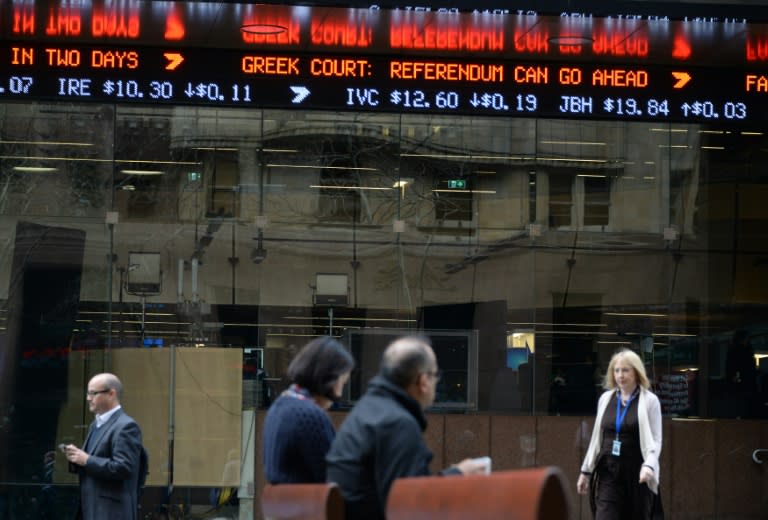 An electronic ticker shows developments on the Greek economy at the central business district of Sydney, on July 7, 2015