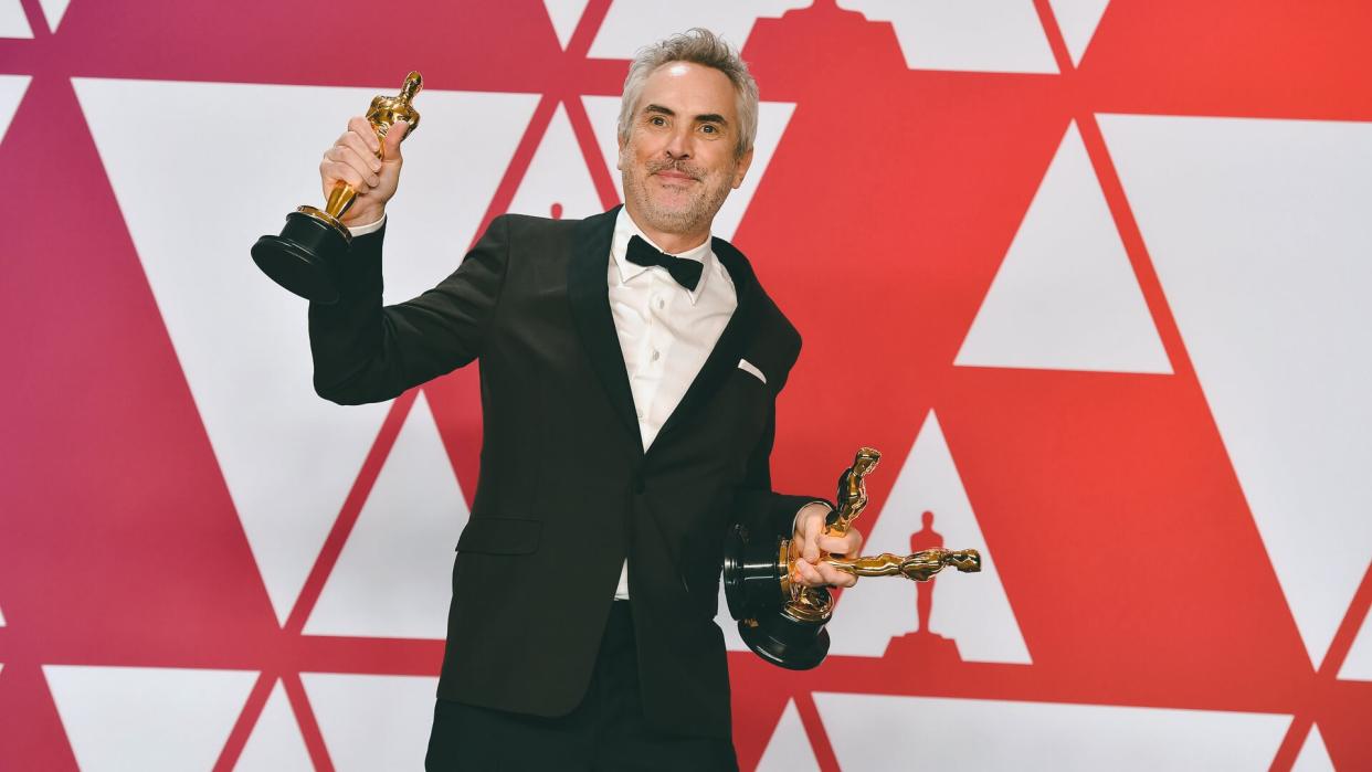 Alfonso Cuaron poses with the awards for best director for "Roma", best foreign language film for "Roma", and best cinematography for "Roma" in the press room at the Oscars, at the Dolby Theatre in Los Angeles91st Academy Awards - Press Room, Los Angeles, USA - 24 Feb 2019.