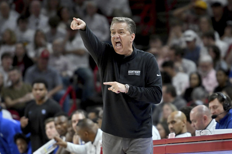 Kentucky coach John Calipari reacts to a call during the second half of an NCAA college basketball game against Arkansas, Saturday, March 4, 2023, in Fayetteville, Ark. (AP Photo/Michael Woods)