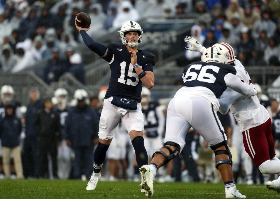 Oct 14, 2023; University Park, Pennsylvania, USA; Penn State Nittany Lions quarterback Drew Allar (15) throws a pass against the Massachusetts Minutemen during the second quarter at Beaver Stadium. Penn State won 63-0. Mandatory Credit: Matthew O'Haren-USA TODAY Sports