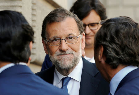 Spain's acting Prime Minister Mariano Rajoy arrives at the parliament in Madrid, Spain August 28, 2016. REUTERS/Andrea Comas