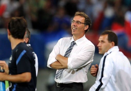 French national football team's head coach Laurent Blanc smiles during the friendly football match France vs Iceland at the Hainaut Stadium in the French northern city of Valenciennes. France battled back from two goals down at half-time to beat Iceland 3-2 and avoid a humiliating defeat in the first of three warm-ups for Euro 2012 here on Sunday