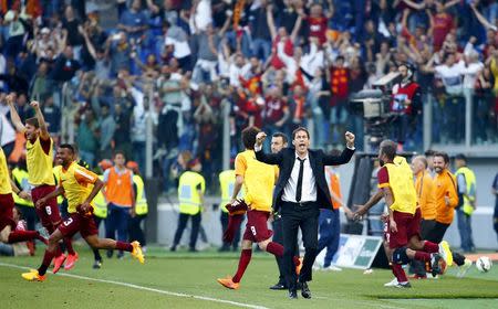 AS Roma's coach Rudi Garcia celebrates at the end of their Serie A soccer match against Lazio at the Olympic stadium in Rome, Italy, May 25, 2015. REUTERS/Tony Gentile