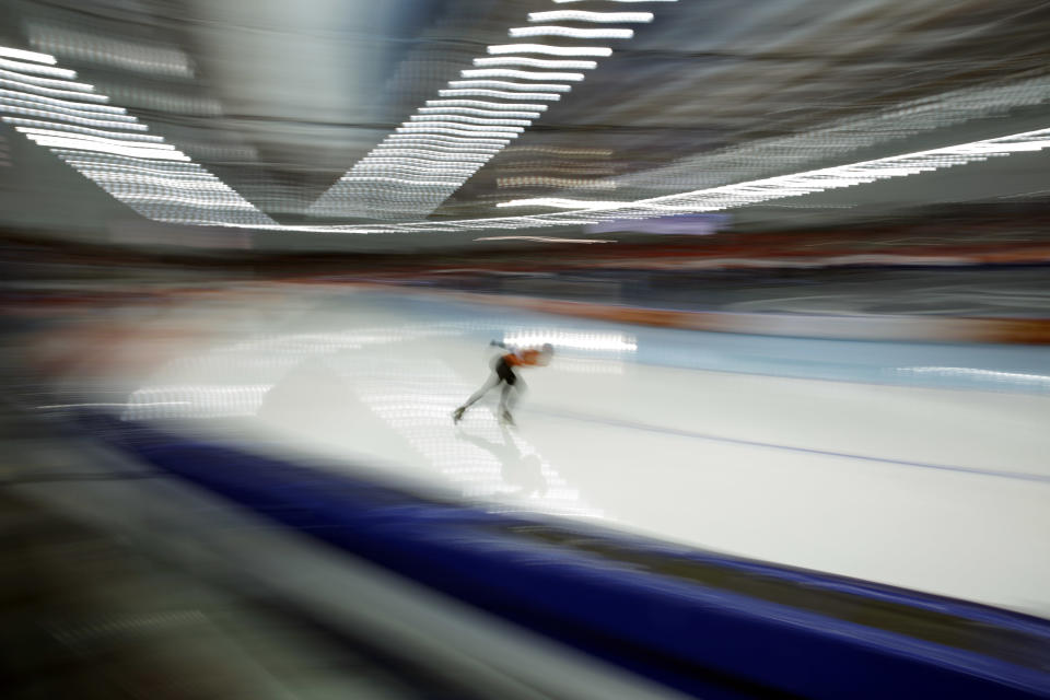 Ireen Wust of the Netherlands skates her way to gold in the women's 3,000-meter speedskating race at the Adler Arena Skating Center during the 2014 Winter Olympics, Sunday, Feb. 9, 2014, in Sochi, Russia. (AP Photo/Matt Dunham)