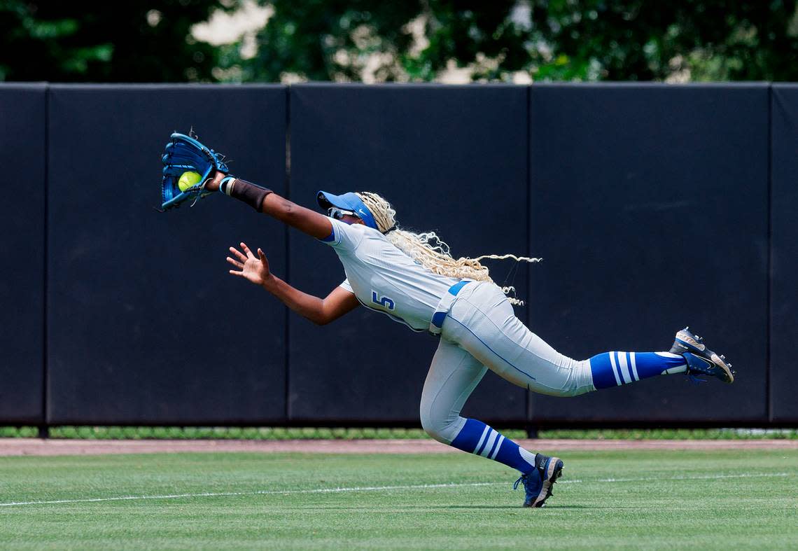 Duke’s Amiah Burgess lunges to make a catch during the fifth inning of the Blue Devils’ 4-3 victory over Clemson in the ACC Tournament semifinals on Friday, May 10, 2024, in Durham, N.C.